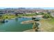 Aerial view of a tranquil lake and lush green park at 16616 E Palisades Blvd # 102, Fountain Hills, AZ 85268
