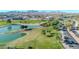 Aerial view of a park with a lake, trees, and walking paths at 16616 E Palisades Blvd # 102, Fountain Hills, AZ 85268