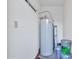 Mechanical room with water heater and storage space at 16616 E Palisades Blvd # 102, Fountain Hills, AZ 85268