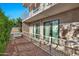 Private patio with metal railing and gravel landscaping at 16616 E Palisades Blvd # 102, Fountain Hills, AZ 85268