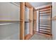 Large walk-in closet with shelves and hanging rods at 16616 E Palisades Blvd # 102, Fountain Hills, AZ 85268