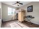Bedroom with built-in desk and loft bed at 17395 W Straight Arrow Ln, Surprise, AZ 85387