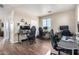Home office with two desks and gaming chairs at 17395 W Straight Arrow Ln, Surprise, AZ 85387
