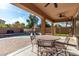Inviting pool area with patio furniture and landscaping at 17395 W Straight Arrow Ln, Surprise, AZ 85387