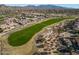 Aerial view of houses and golf course at 18088 W Narramore Rd, Goodyear, AZ 85338