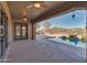 Inviting backyard oasis featuring a sparkling pool, expansive patio, and serene mountain views at 18088 W Narramore Rd, Goodyear, AZ 85338