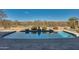 Enjoy this amazing backyard pool and spacious patio area at 18088 W Narramore Rd, Goodyear, AZ 85338