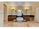 Spa-like bathroom featuring double vanities and a large soaking tub at 18088 W Narramore Rd, Goodyear, AZ 85338