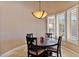 Cozy breakfast nook with a round table and four chairs at 18088 W Narramore Rd, Goodyear, AZ 85338