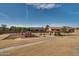 Community park with playground, gazebo, and benches at 18088 W Narramore Rd, Goodyear, AZ 85338