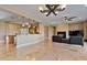 Open kitchen with island and breakfast bar at 18088 W Narramore Rd, Goodyear, AZ 85338