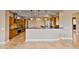 Modern kitchen with wood cabinets and granite countertops at 18088 W Narramore Rd, Goodyear, AZ 85338