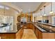 Modern kitchen featuring a large island and updated appliances at 18088 W Narramore Rd, Goodyear, AZ 85338