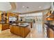 Open kitchen with stainless steel appliances and an island at 18088 W Narramore Rd, Goodyear, AZ 85338