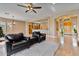 Open living room with a view of kitchen and entry at 18088 W Narramore Rd, Goodyear, AZ 85338