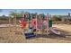 Community playground with slides and climbing structures at 18088 W Narramore Rd, Goodyear, AZ 85338