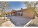 Home's backyard features a sparkling pool and patio area at 18088 W Narramore Rd, Goodyear, AZ 85338