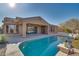 Enjoy the Arizona sunshine by this beautiful pool and spacious patio at 18088 W Narramore Rd, Goodyear, AZ 85338