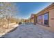 Spacious poolside patio with lush landscaping and views at 18088 W Narramore Rd, Goodyear, AZ 85338