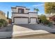 Two-story house with two-car garage and desert landscaping at 2123 E La Costa Dr, Chandler, AZ 85249