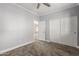 Well-lit bedroom featuring neutral walls and carpet at 25231 W Blue Sky Dr, Wittmann, AZ 85361