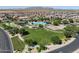 Aerial view of community pool, park and surrounding homes at 2625 E Santa Ynez Dr, Casa Grande, AZ 85194