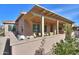 Outdoor patio space with pergola, seating, and built-in grill at 2627 E San Simeon Dr, Casa Grande, AZ 85194