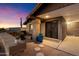 Brick front entry with decorative door and desert plants at 34642 N 52Nd St, Cave Creek, AZ 85331