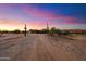 Driveway leading to a ranch-style home, horse corral visible at 34642 N 52Nd St, Cave Creek, AZ 85331