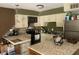 Efficient kitchen with granite countertops and modern appliances at 37618 N Tranquil Trl # 9, Carefree, AZ 85377