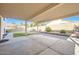 Covered patio overlooks a grassy backyard at 4054 W Avenida Del Sol --, Glendale, AZ 85310