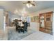 Spacious dining area with a large table and kitchen access at 657 N Gregory Pl, Chandler, AZ 85226