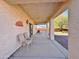 Covered patio with ceiling fan and view of the backyard at 11100 W Magdalena Dr, Arizona City, AZ 85123