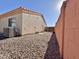 Backyard view showing AC unit and side of house at 11100 W Magdalena Dr, Arizona City, AZ 85123