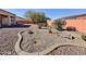 Landscaped backyard with gravel and desert plants at 11100 W Magdalena Dr, Arizona City, AZ 85123