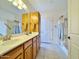 Double vanity bathroom with shower and tub at 11100 W Magdalena Dr, Arizona City, AZ 85123