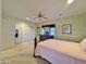 Spacious bedroom with double closets and ceiling fan at 11100 W Magdalena Dr, Arizona City, AZ 85123