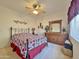 Bright bedroom with ceiling fan and built-in dresser at 11100 W Magdalena Dr, Arizona City, AZ 85123
