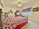 Charming bedroom with floral bedding and ceiling fan at 11100 W Magdalena Dr, Arizona City, AZ 85123