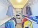 Large walk-in closet with double hanging rods at 11100 W Magdalena Dr, Arizona City, AZ 85123