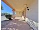 View of the covered patio area, offering shade and outdoor space at 11100 W Magdalena Dr, Arizona City, AZ 85123