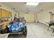 Garage with storage cabinets and a dune buggy at 11100 W Magdalena Dr, Arizona City, AZ 85123