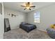 Cozy bedroom with a full-size bed and mirrored closet at 14575 W Orange Dr, Litchfield Park, AZ 85340