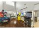 Game room featuring multiple arcade games and wood flooring at 14575 W Orange Dr, Litchfield Park, AZ 85340