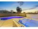 Hot tub with blue lighting at night at 14575 W Orange Dr, Litchfield Park, AZ 85340