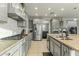 Modern kitchen with stainless steel appliances and granite countertops at 14575 W Orange Dr, Litchfield Park, AZ 85340
