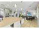 Open concept kitchen with large island and breakfast bar at 14575 W Orange Dr, Litchfield Park, AZ 85340