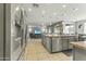 Spacious kitchen with granite countertops and stainless steel appliances at 14575 W Orange Dr, Litchfield Park, AZ 85340