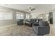 Gathering room with comfortable seating and a ceiling fan at 14575 W Orange Dr, Litchfield Park, AZ 85340