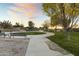 Community park with a walking path and benches at 14575 W Orange Dr, Litchfield Park, AZ 85340